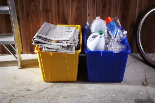 Workers wearing PPE while sorting office waste